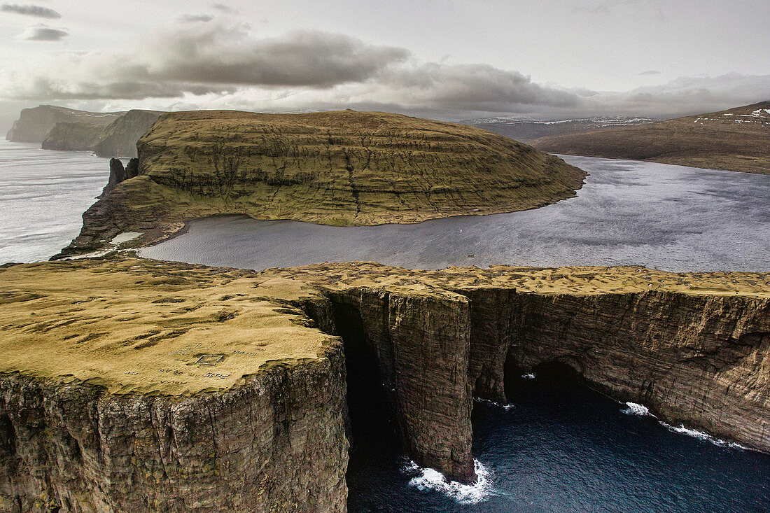 Leitisvatn Or Sorvagsvatn Lake On Cliff Top By Ocean, Vagar, Faroe Islands
