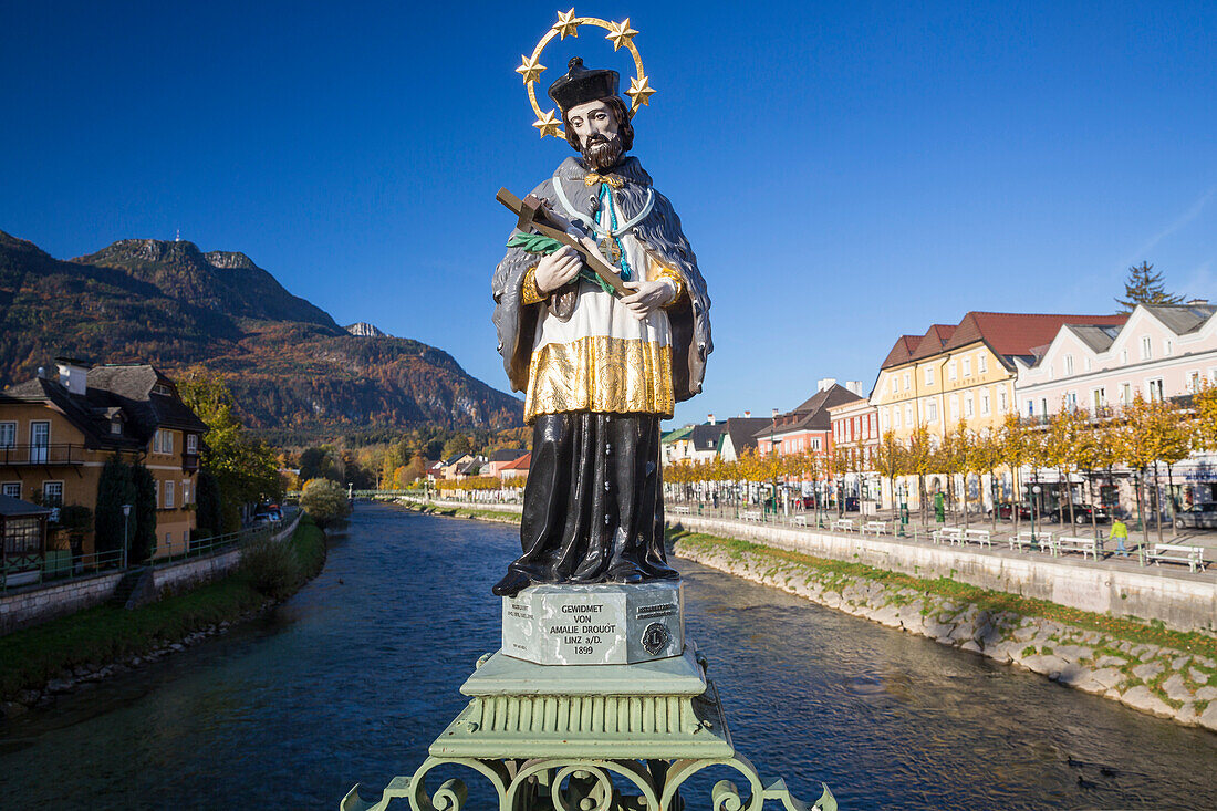 Statue of Johannes Nepomuk on Traun bridge with view to Mount Katrin, Bad Ischl, Salzkammergut, Upper Austria, Austria, Europe