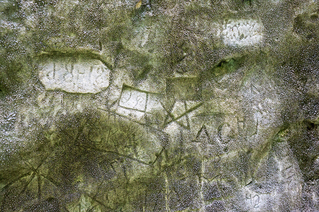 ' Historic rock engravings in ''Notgasse'', gorge in the Dachstein area, Styria, Austria, Europe'