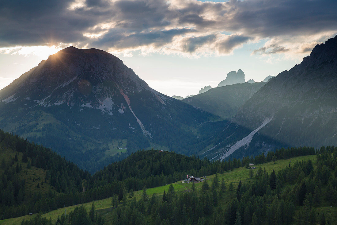 Sunset behind Mount Roetelstein, right Mount Bischofsmuetze, front Walcheralm, Dachstein area, Styria, Austria, Europe