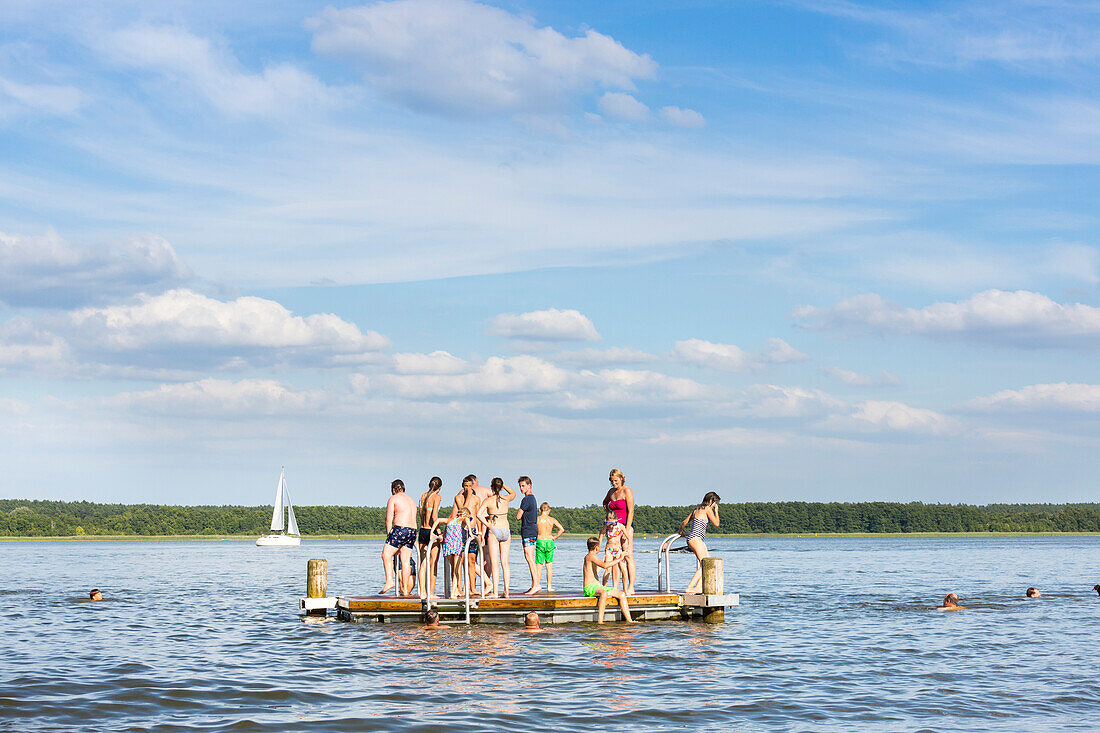 Kids swimming, beach, playing in the water, near campsite Havelberge, lake Woblitzsee, holiday, summer, swimming, sport, Mecklenburg lakes, Mecklenburg lake district, Granzow, Mecklenburg-West Pomerania, Germany, Europe