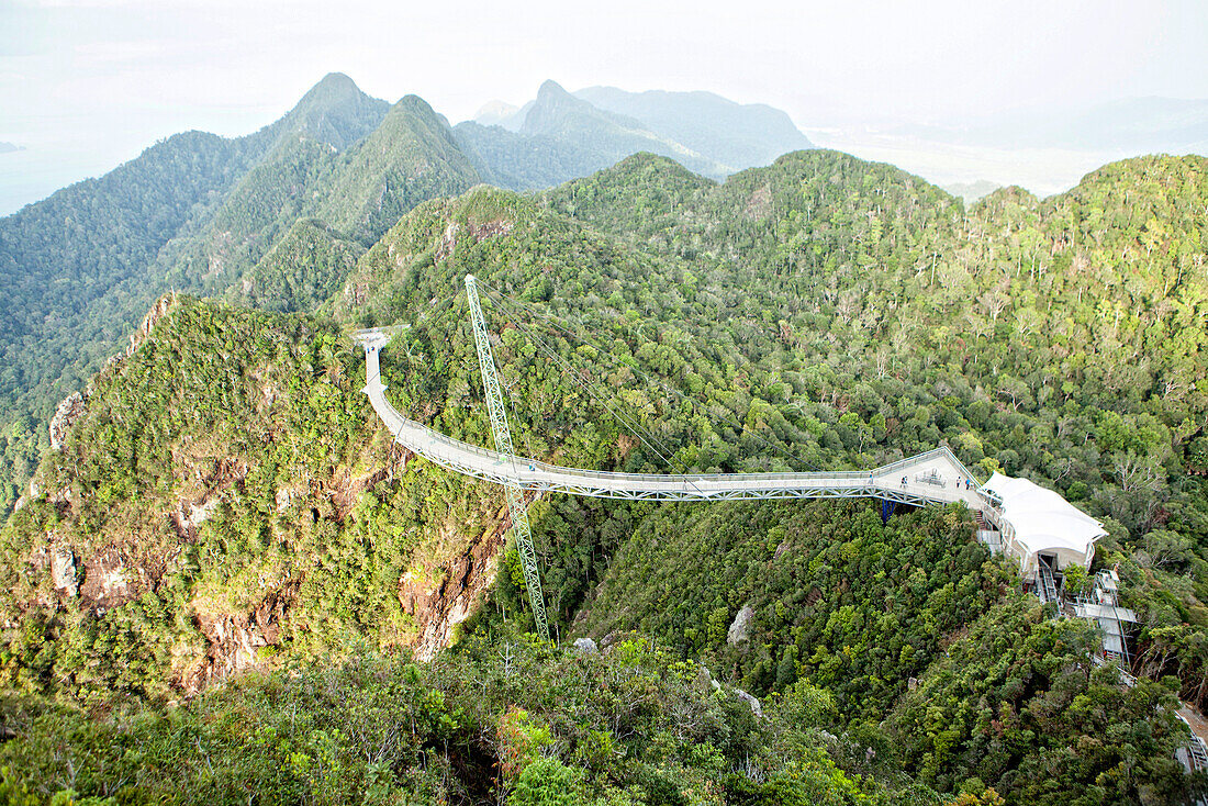 Langkawi cable car is the steepest cable car ride on earth and takes visitors up 708m above sea level to the curved pedestrian sky bridge is built atop Langkawi's second highest peak of Mt. Machinchang.  Langkawi, officially known as Langkawi the Jewel of