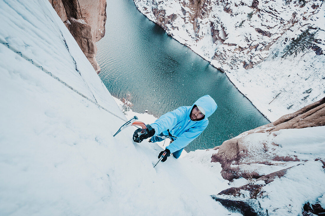 High angle view of Man ice climbing at Chipeta falls, Colorado