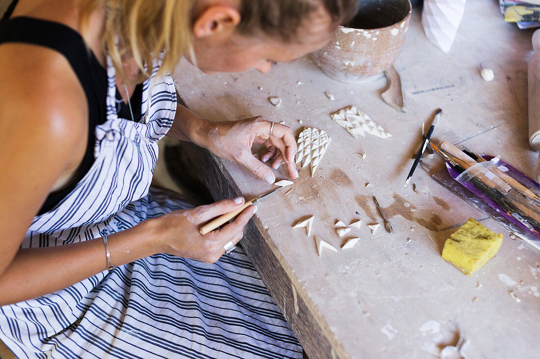 Artistic Woman Working In Ceramic Workshop