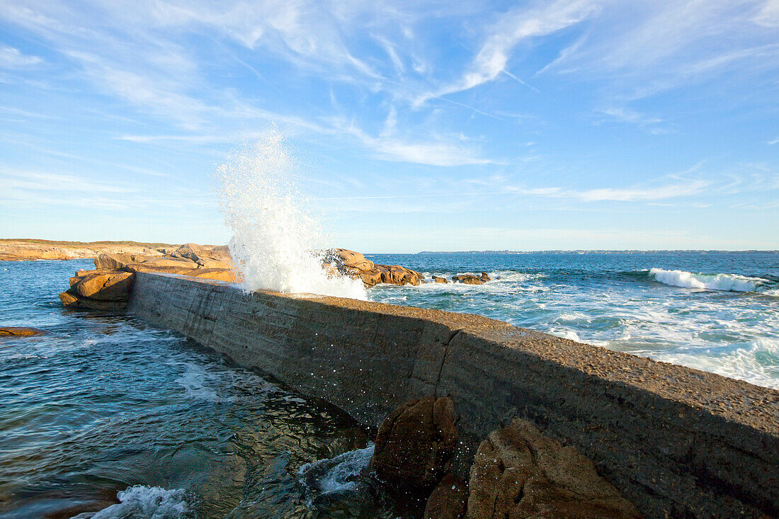 Wave Breaking On The Wall Of Beach In Ile De Groix, France