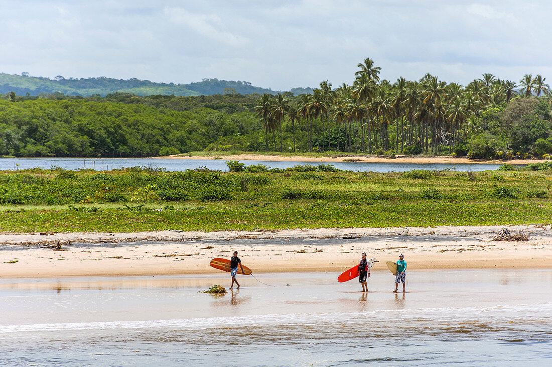 Surfers in Itacare Beach, South Bahia, Brazil