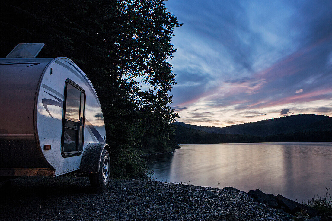 A Teardrop Camper Parked Next To Lake At Sunset In Deboullie Public Reserved Land, Maine