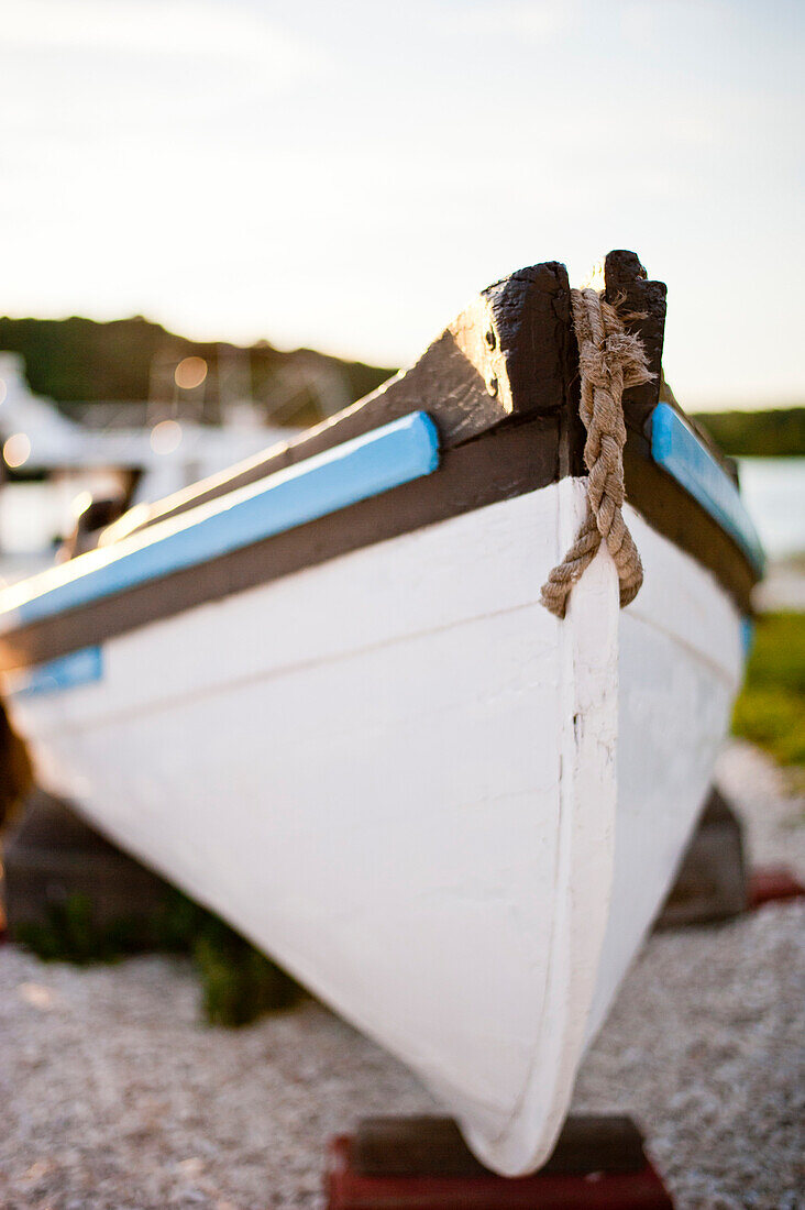 Close-up of a small wooden boat bow