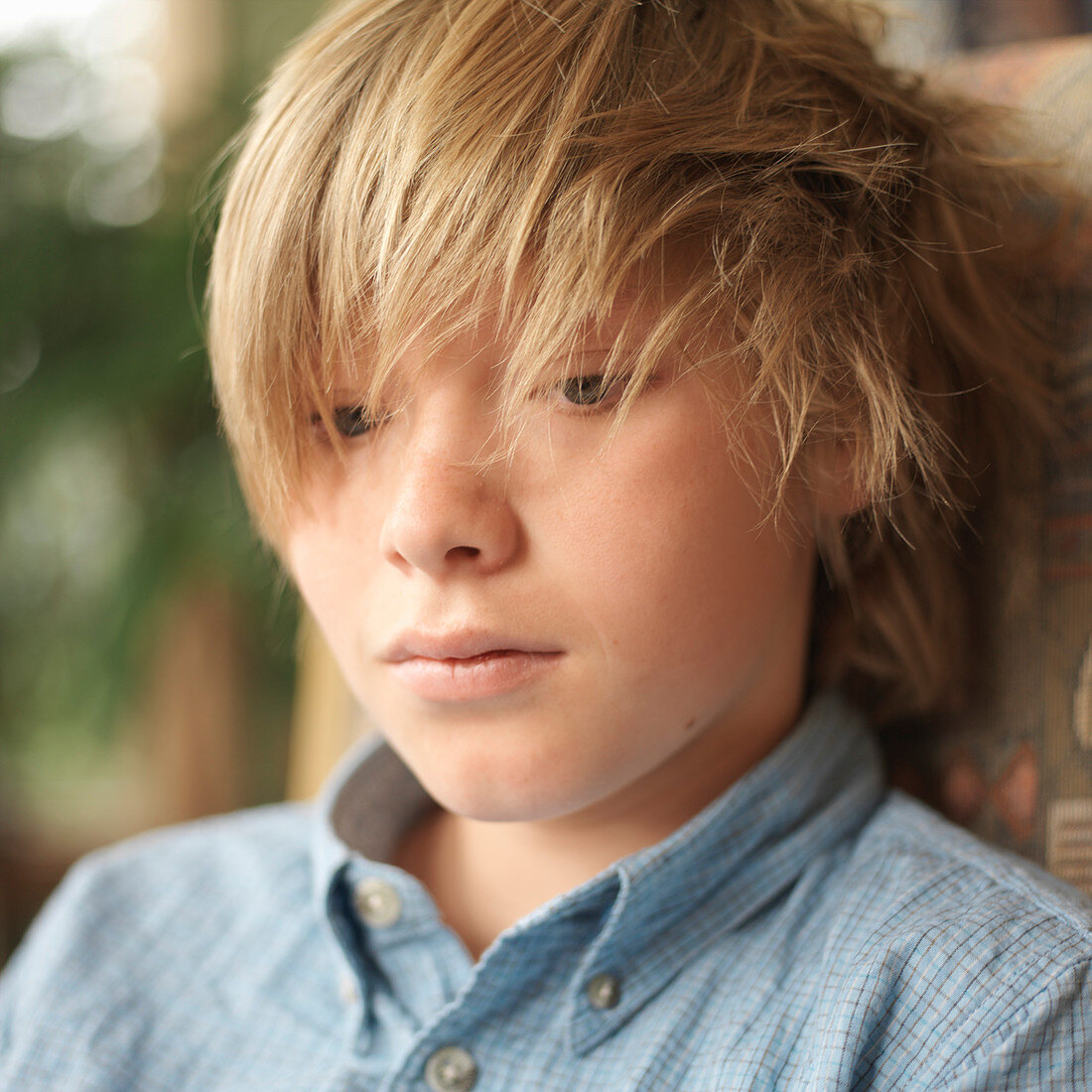 Portrait of tween boy with messy hair