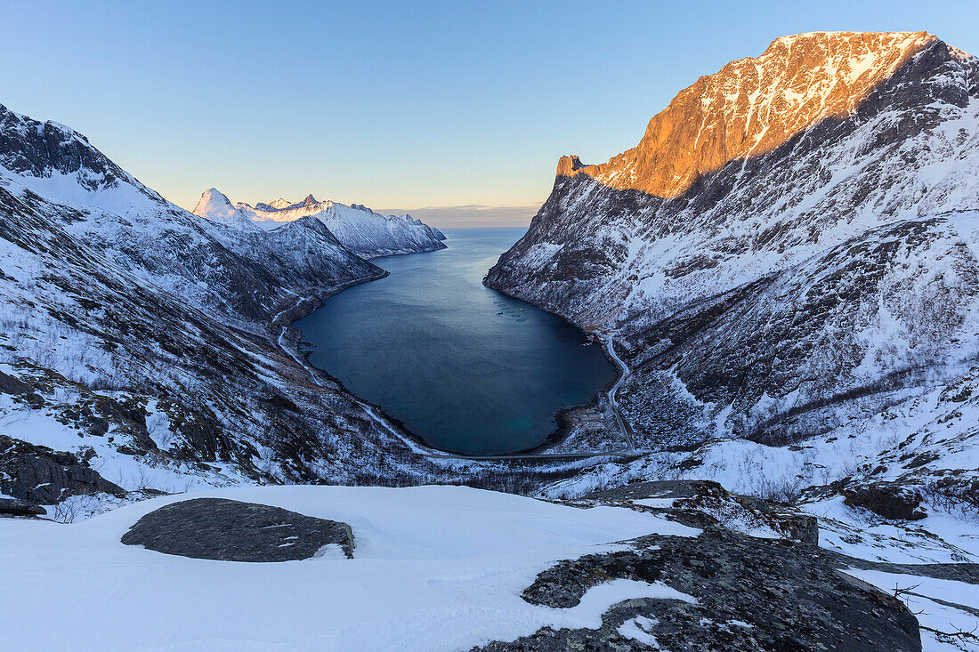 View of Oyfjorden during the last sun illuminating the peaks,  Barden, Mefjordbotn, Mefjorden, Senja, Norway, Europe