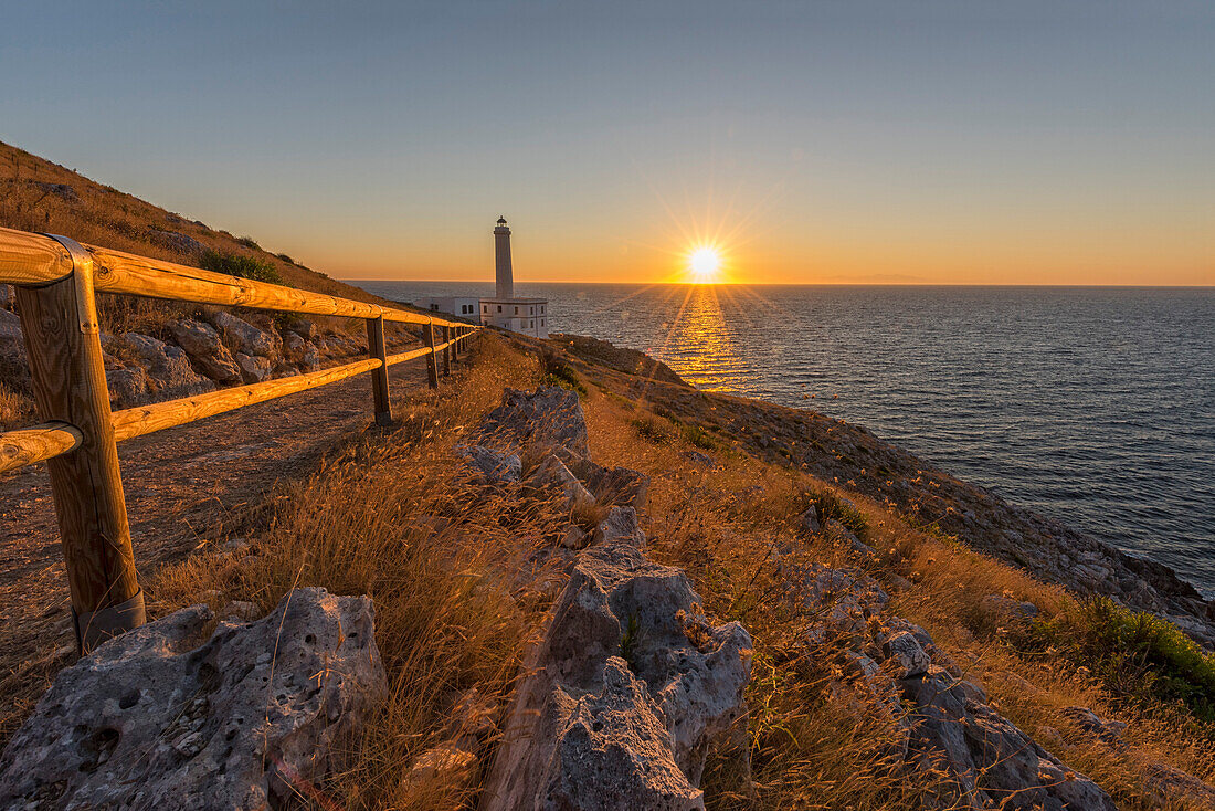 Italy, Apulia, Salento, Capo d'Otranto, Sunrise over lighthouse Palascio