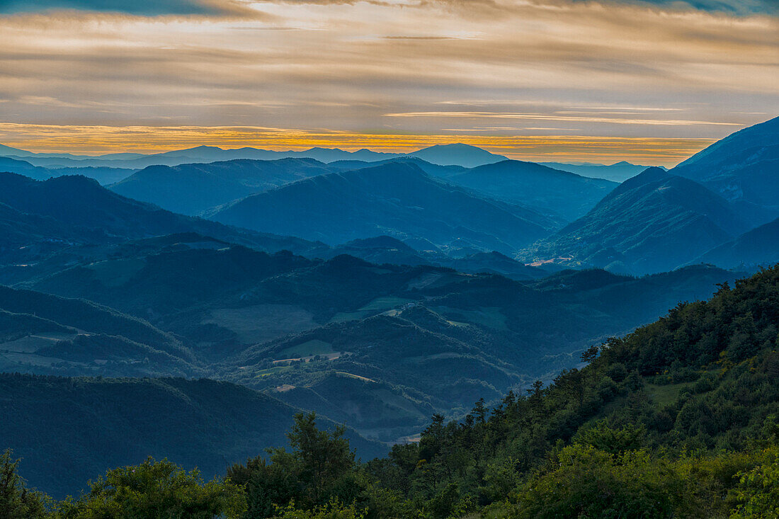 Italy, Umbria, Mt Catria, Sunset over Umbrian Apennines in Summer