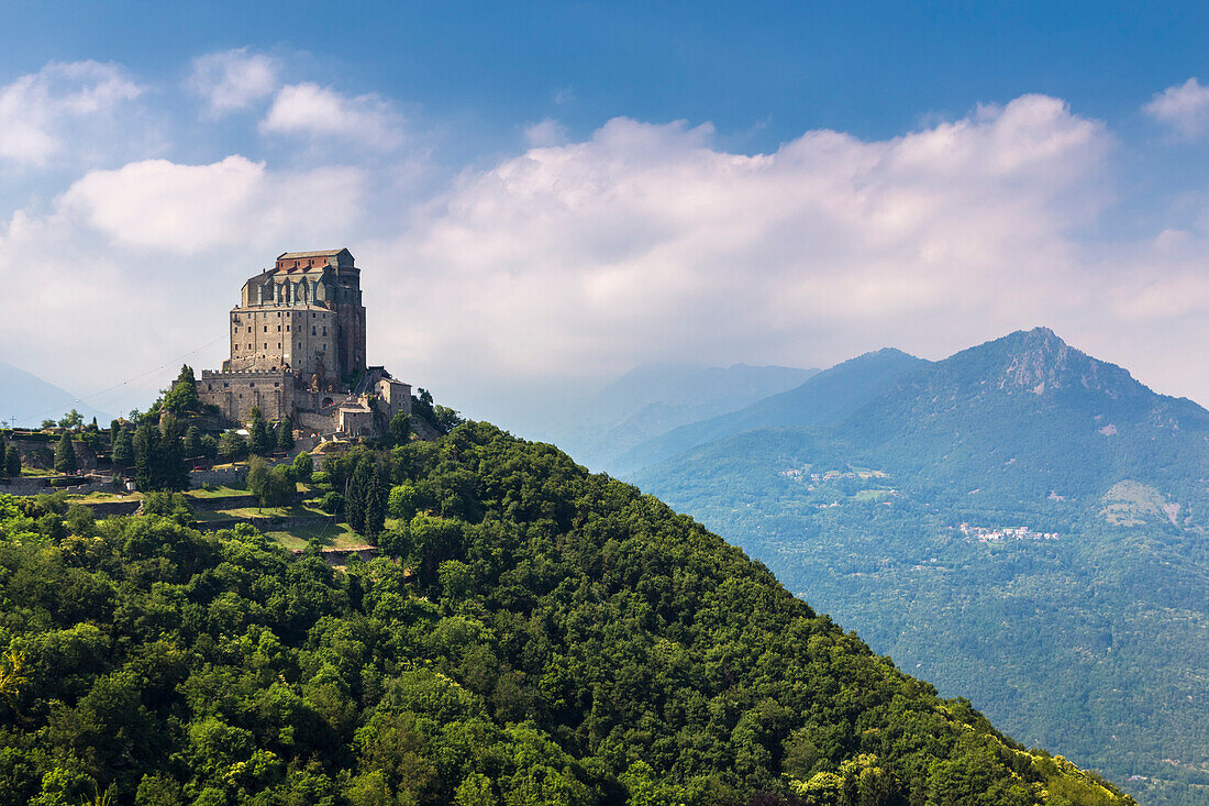 View of the monastery called Sacra di San Michele, symbol of Piedmont region, located on the mount Pirchiriano, Sant'Ambrogio di Torino, Val di Susa, Torino district, Piedmont, Italy