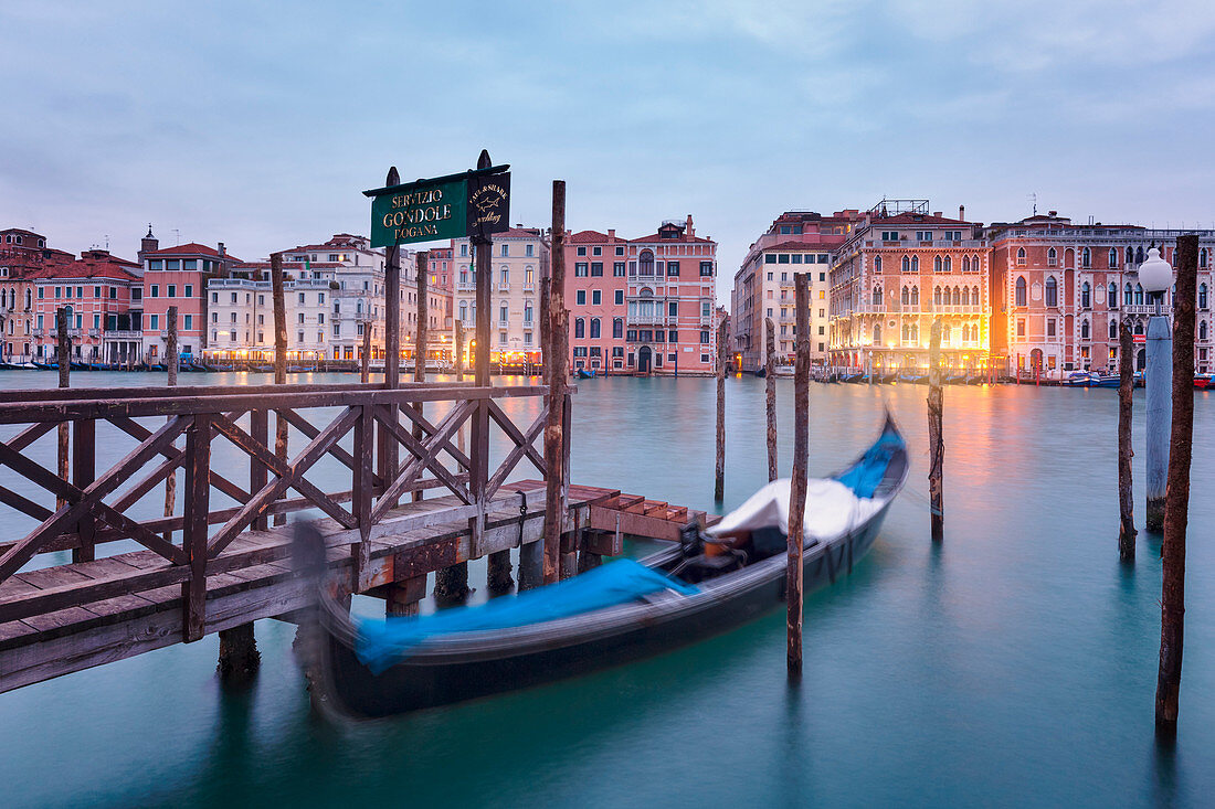 Europe, Italy, Veneto, Venice,  The iconic venetian gondola on the Grand Canal at dawn