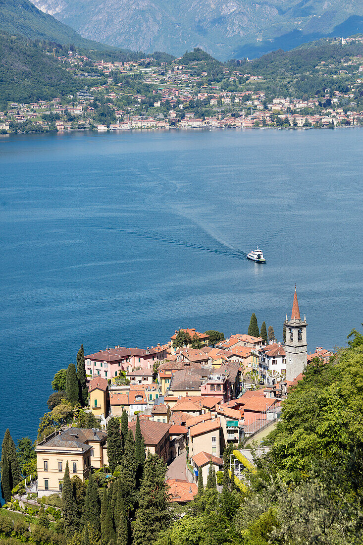 The typical village of Varenna surrounded by the blue water of Lake Como and gardens Province of Lecco Lombardy Italy Europe