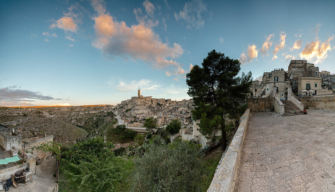 Sunset on the ancient town and historical center called Sassi perched on rocks on top of hill Matera Basilicata Italy Europe