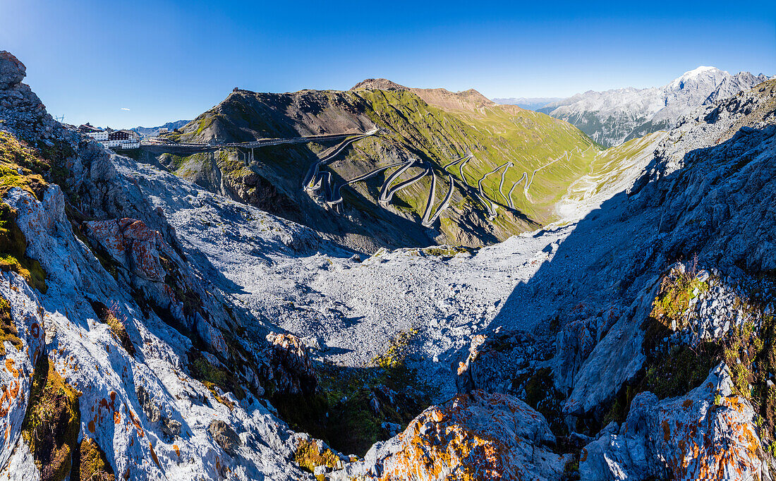 Panorama of rocky peaks and hairpin turns at Stelvio Pass Valtellina Lombardy Trentino Alto Adige Italy Europe