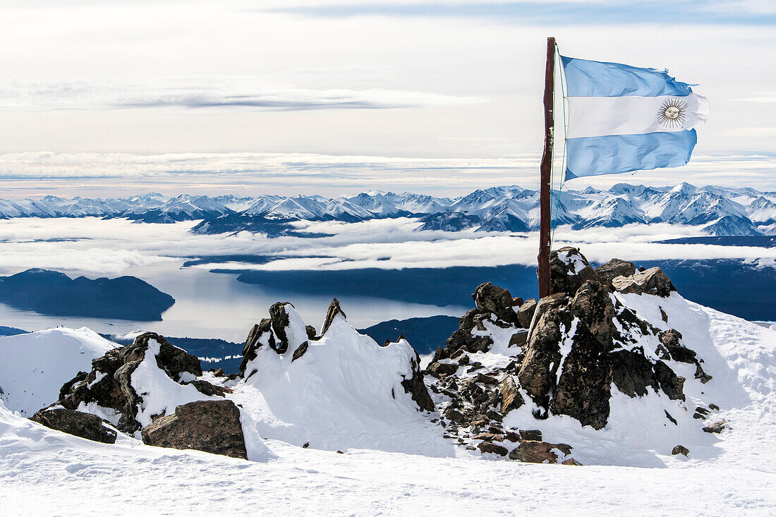 The Ripped And Torn Argentina Flag On The Top Of Cerro Catedral Resort