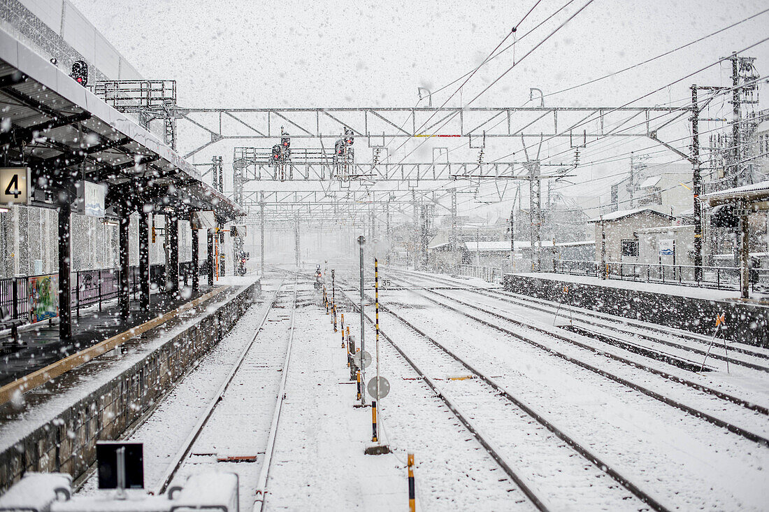 Snow Storm At A Train Station In Japan