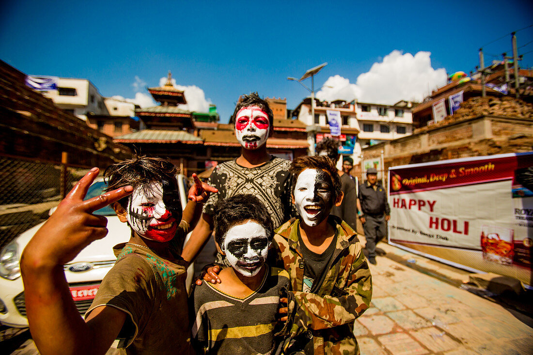 Kids with faces painted at the Holi Festival, Durbar Square, Kathmandu, Nepal, Asia