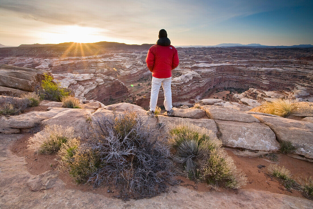 Whit Richardson looking at the view into the Maze from the Maze Overlook campground, Canyonlands National Park, Utah.