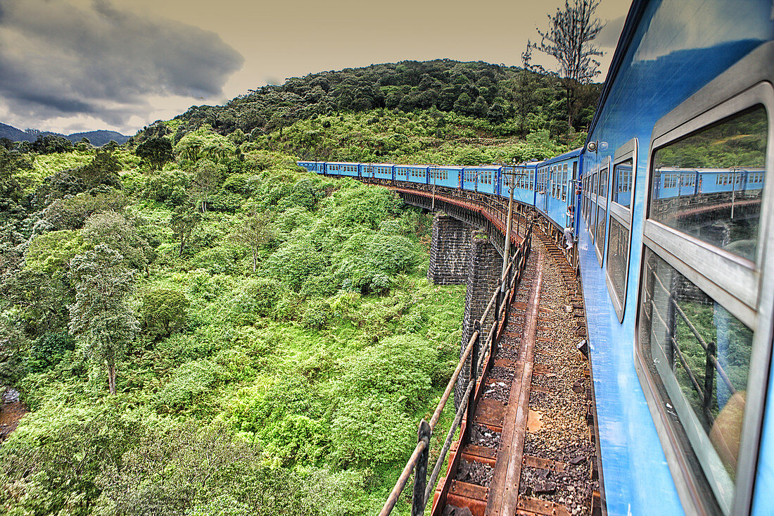 train from Nuwara Eliya to Kandy among tea plantations in the highlands of Sri Lanka