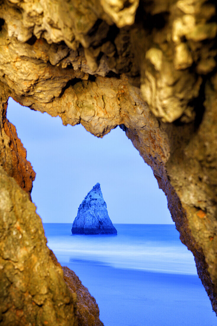 Cliffs and rocks at the beach Praia dos Tres Irmaos, Alvor, Portimao, Algarve, Portugal