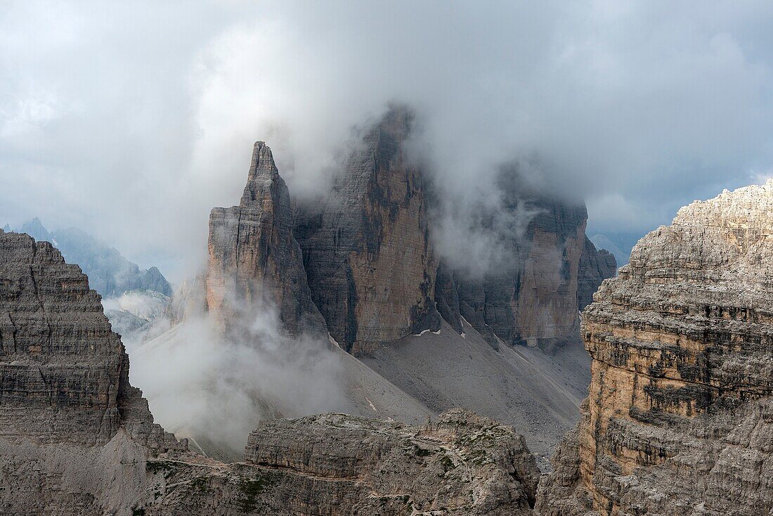 Sesto, Dolomites, South Tyrol, Italy Fog envelops the Tre Cime di Lavaredo   Drei Zinnen