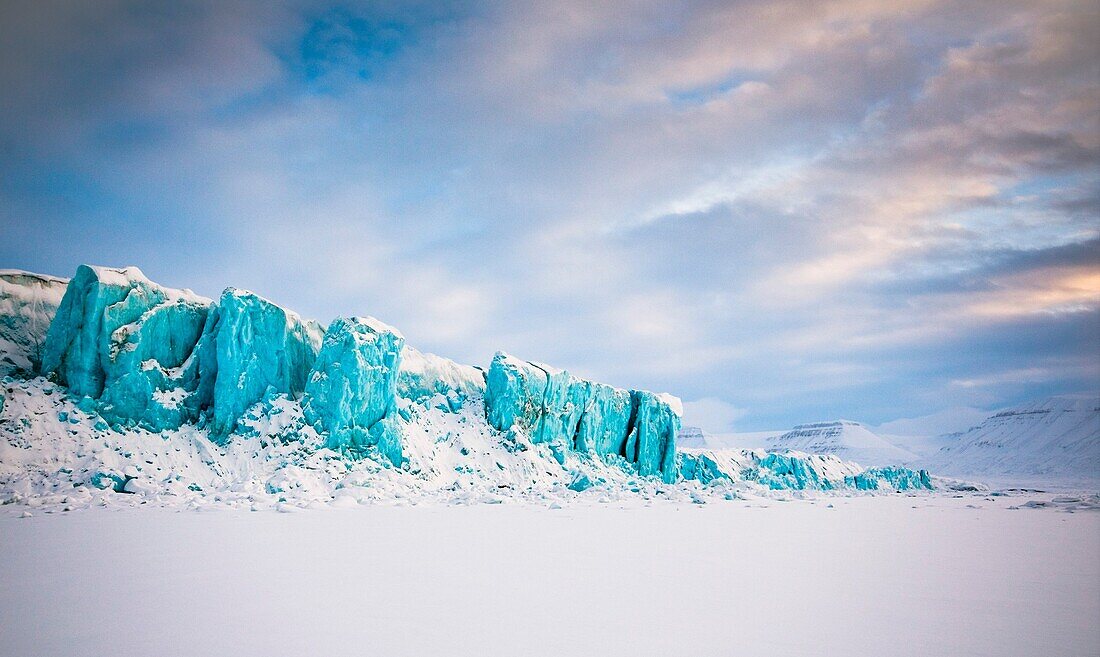 The ice cliff of Tunabreen glacier in Spitzbergen, Svalbard, Norway