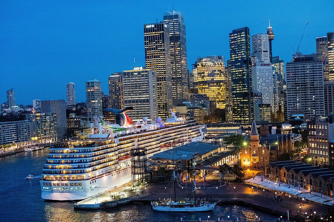 Sydney city skyline and berthed cruise ship