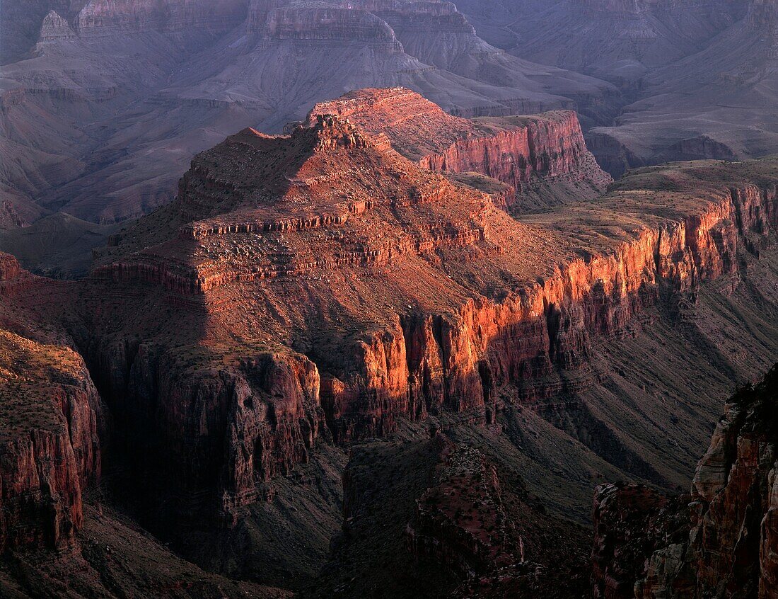 USA, Arizona, Grand Canyon National Park, North Rim, Setting sun warms Krishna Shrine, view south from Cape Royal