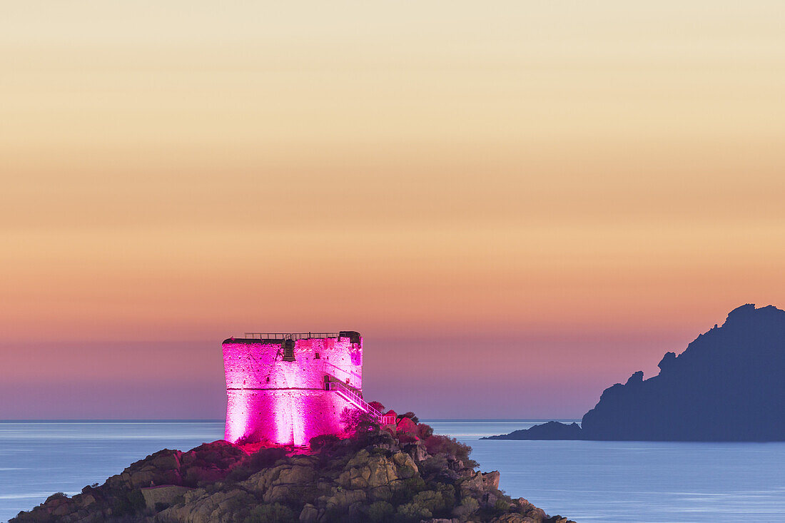 Illuminated tower in Porto in the west coast, West Corsica, Corsica, Southern France, France, Southern Europe, Europe