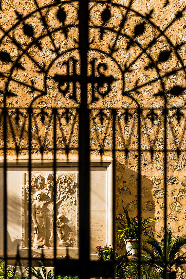 The entrance to the court of the parish church Saint Bartholomäus, Sóller, Mallorca, Spain