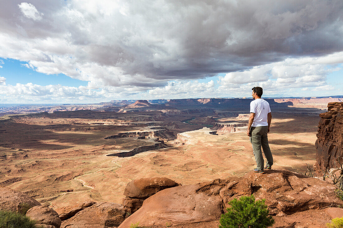 Man overlooking the landscape in Canyonlands National Park, Moab, Utah, United States of America, North America