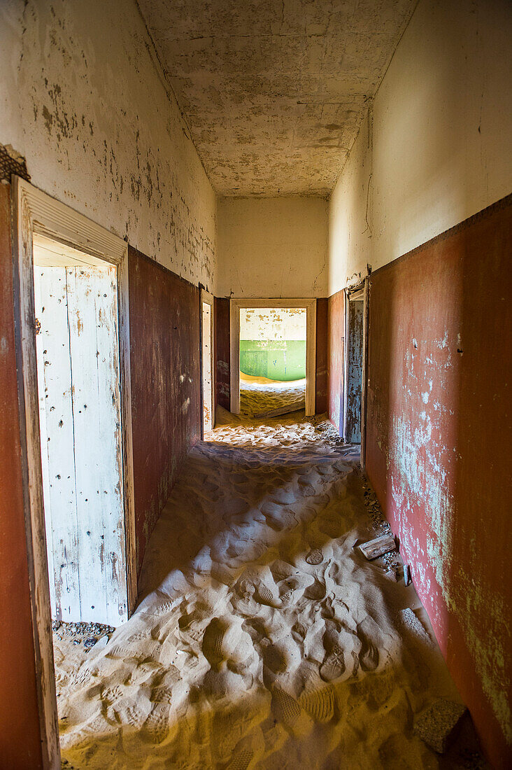 Sand in an old colonial house, old diamond ghost town, Kolmanskop (Coleman's Hill), near Luderitz, Namibia, Africa
