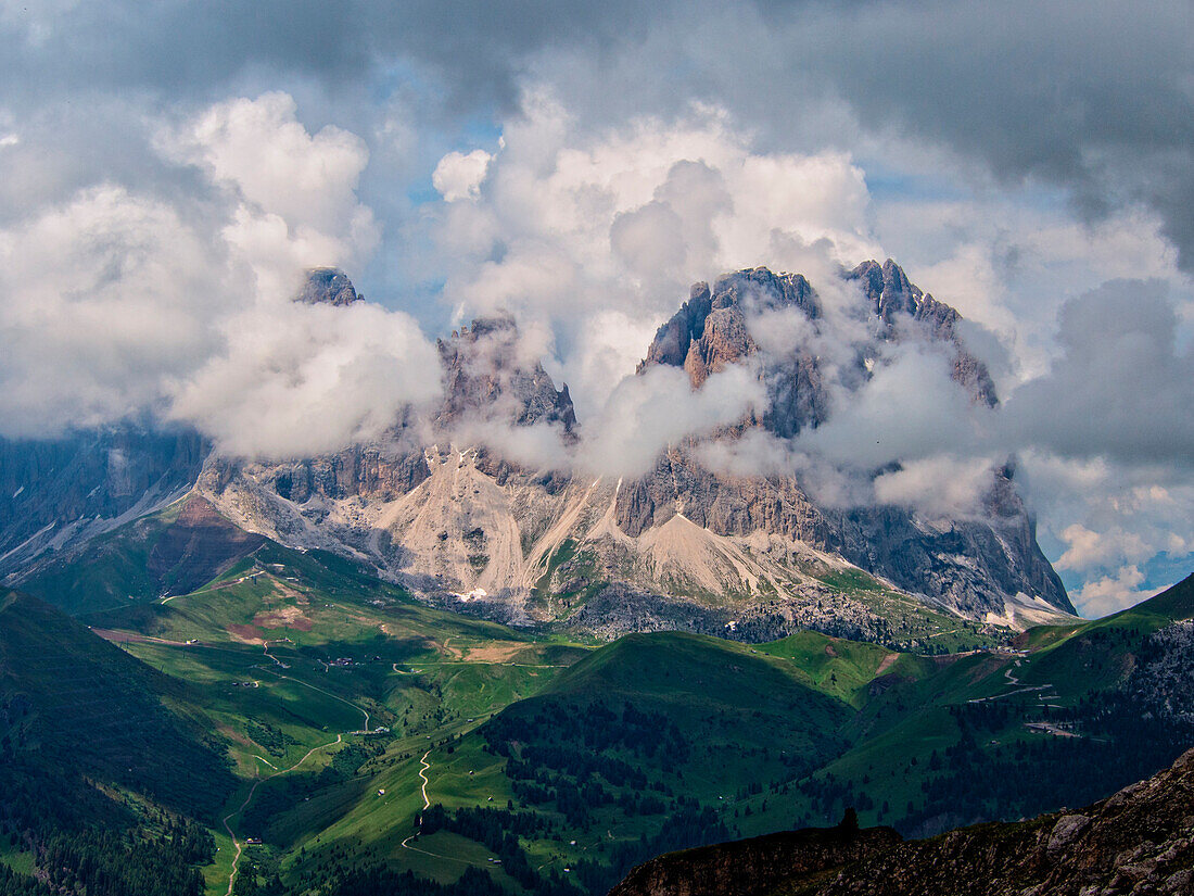 Italy, Trentino, Dolomites, Sass Pordoi mountain in the clouds