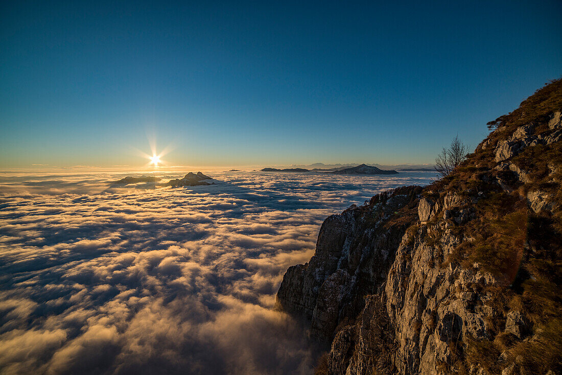 Sunset over the fog, Coltignone Mount, Piani Resinelli, Lecco province, Lombardy, Italy, Europe