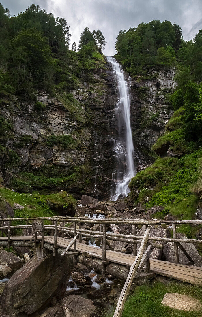 Wooden bridge under the Cascata della Froda, Sonogno, Valle Verzasca, Canton Ticino, Switzerland