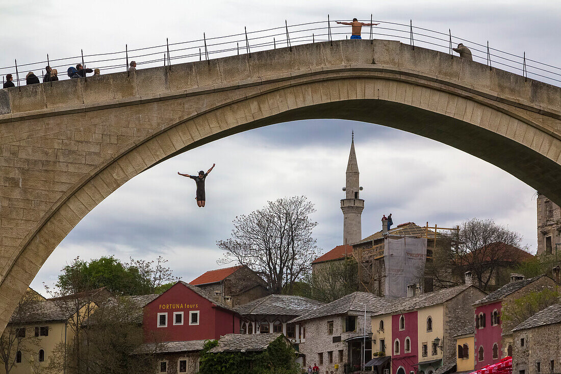 The famous jump in the Naretva river from the Stari Most , Old Bridge, Eastern Europe, Mostar, Bosnia and Herzegovina
