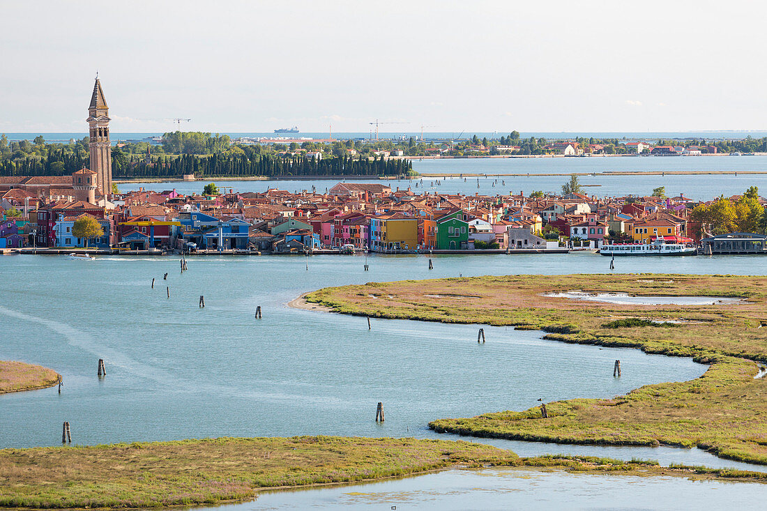 View of the typical colored houses and historical buildings of island of Burano from Torcello Venice Veneto Italy Europe