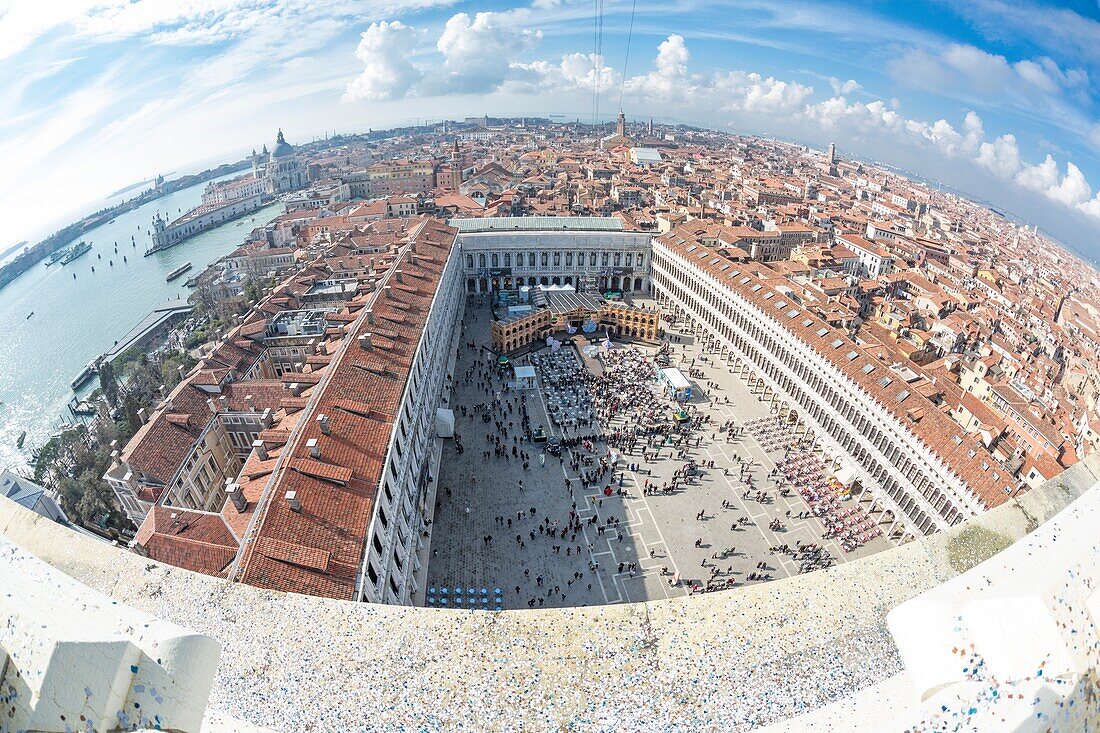 Top view of the historical buildings and the lagoon from the St Mark's bell tower Venice Veneto italy Europe
