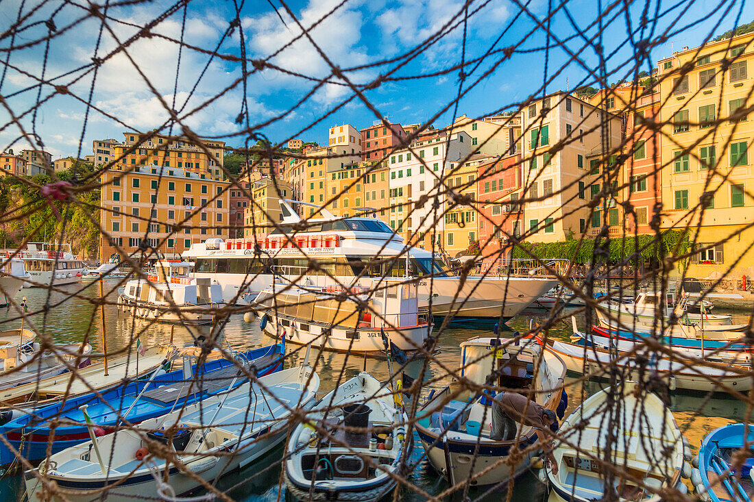 Fishing net frames harbour and village of Camogli Gulf of Paradise Portofino National Park Genoa province Liguria Italy Europe
