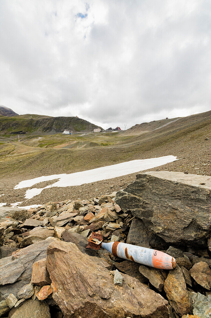 A bomb of World War I on the rocky mountains Braulio Valley Stelvio Pass Valtellina Lombardy Italy Europe