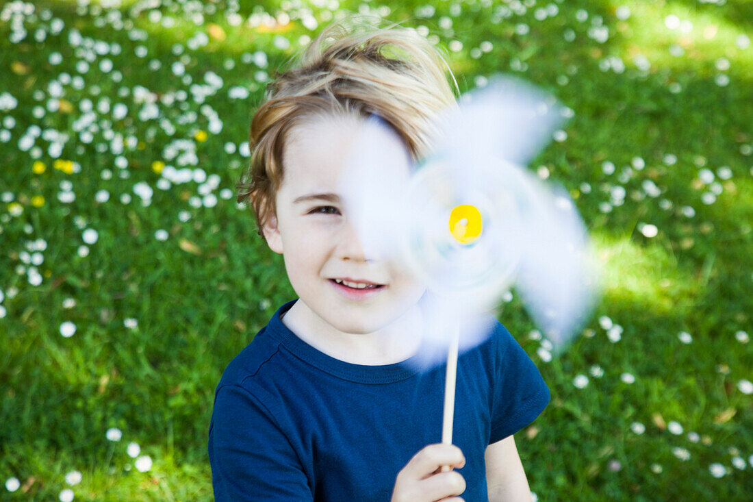 Young Boy with Pinwheel Toy