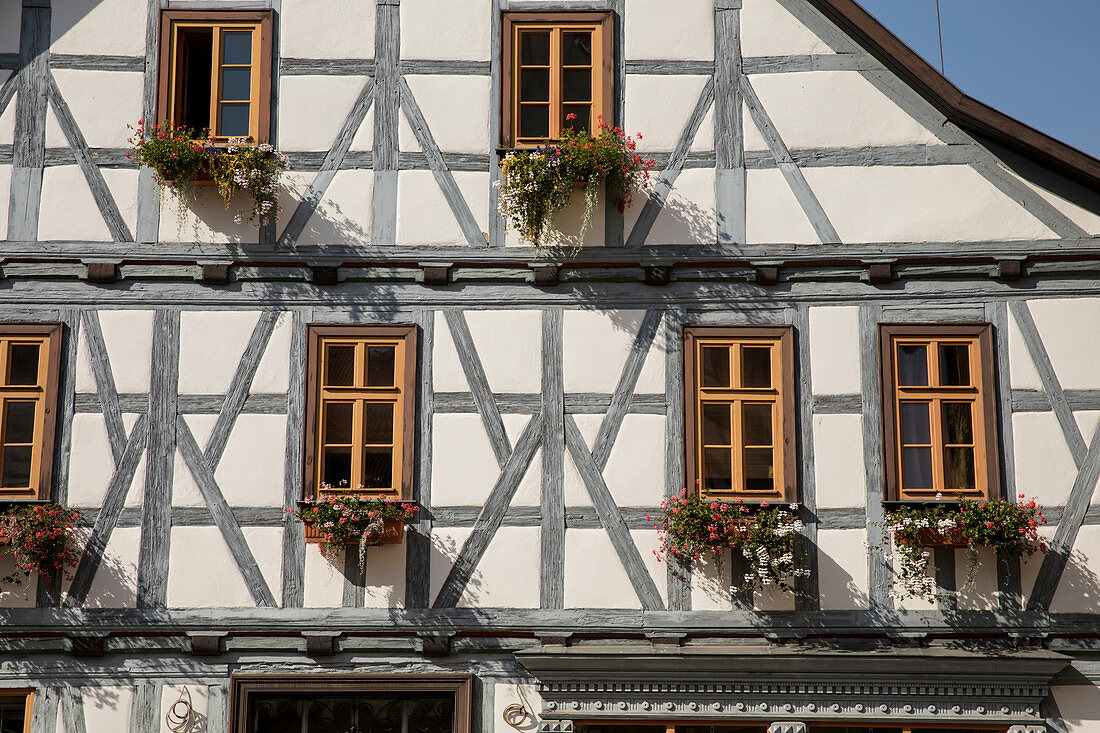 Blue half-timbered house with flower boxes, Schmalkalden, Thuringia, Germany, Europe