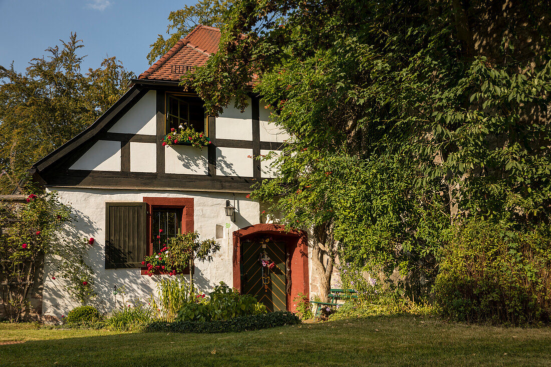 Idyllic half-timbered house on the grounds of Wilhelmsburg Castle, Schmalkalden, Thuringia, Germany, Europe