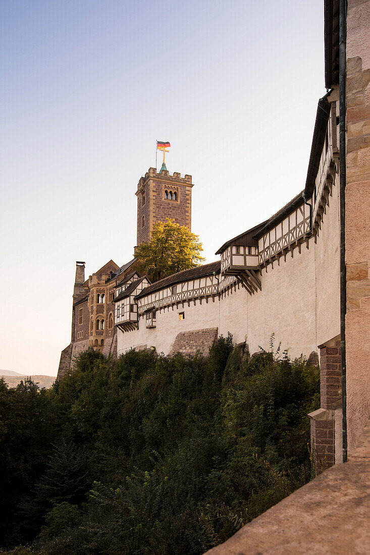 Wartburg castle, UNESCO World Cultural Heritage Site, in the light of the setting sun, Eisenach, Thuringia, Germany, Europe