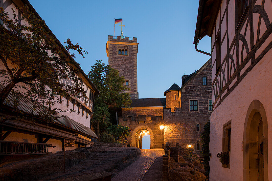 Ascent to the first Burghof with a view of Wartburg castle's Bergfried at dusk, Eisenach, Thuringia, Germany, Europe