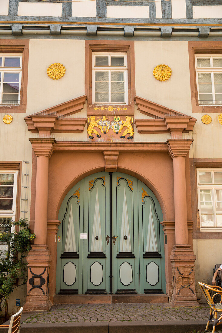 Historic house gate and door with golden lions above the entrance, Marburg, Hesse, Germany, Europe