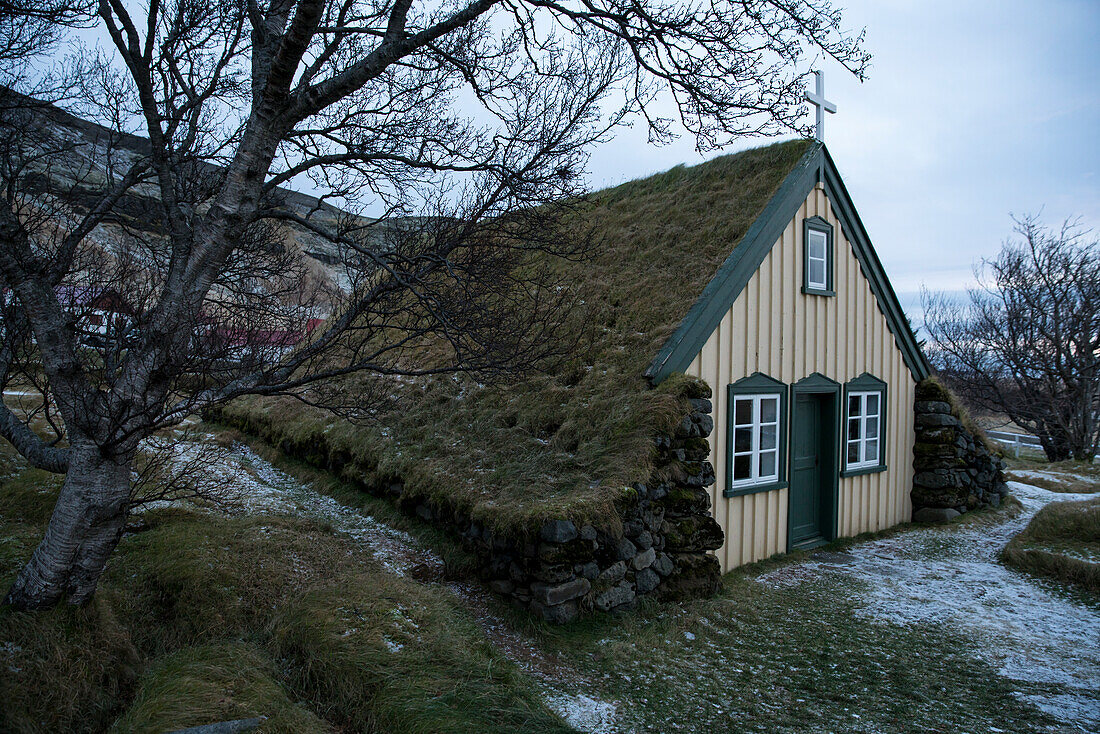 The church Hofskirkja in winter time, Hof, Iceland, Europe